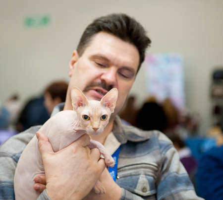 MOSCOW - MARCH 6: Unidentified people visit an international exhibition of cats "Catsburg" on March 6, 2011 in the exhibition hall Crocus-Expo, Moscowのeditorial素材
