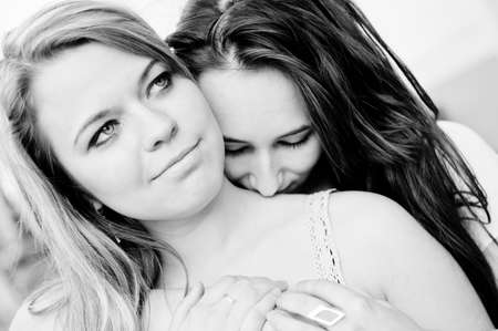 Two young girls black and white portraitの写真素材