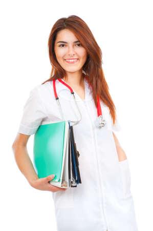 Young medical smiling woman doctor carrying medical filesの写真素材