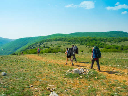 Young people hikes in Crimea mountainsの写真素材