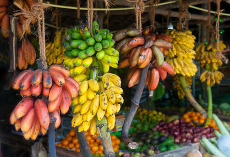 A lot of tropical fruits in outdoor market in Sri-Lankaの写真素材