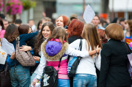 MOSCOW - SEPTEMBER 16: Young people having fun on the Dreamflash holiday on September 16, 2012 in Moscow. On this positive festival people paint their faces, offering free hugs and blow bubbles.のeditorial素材