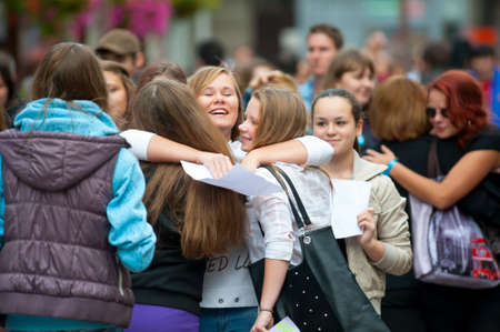 MOSCOW - SEPTEMBER 16: Young people having fun on the Dreamflash holiday on September 16, 2012 in Moscow. On this positive festival people paint their faces, offering free hugs and blow bubbles.のeditorial素材