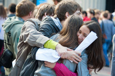 MOSCOW - SEPTEMBER 16: Young people having fun on the Dreamflash holiday on September 16, 2012 in Moscow. On this positive festival people paint their faces, offering free hugs and blow bubbles.のeditorial素材