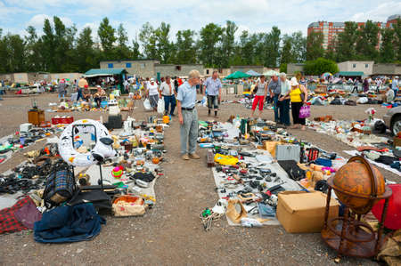 MOSCOW - JULY 7: Weekend flea market "Levsha" at Novopodrezkovo on July,7 2012 in Moscow. Flea market in Moscow has been moved to a new place and now it works every weekend. It's very cheap.のeditorial素材