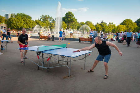 MOSCOW - JULY 8: Unidentified people take a rest in Gorky Park on July 8, 2012 in Moscow. In recent years Gorky Park has been fully renovated to create a modern space for recreation of the urbanites.のeditorial素材