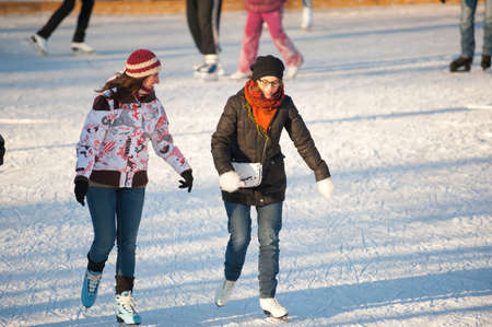 MOSCOW - DECEMBER 16: Unidentified people ride on skating rink in Gorky Park on December 16, 2012 in Moscow. In recent years Gorky Park has been fully renovated to create a modern space for recreationのeditorial素材