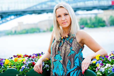 Young blonde woman portrait outdoorsの写真素材