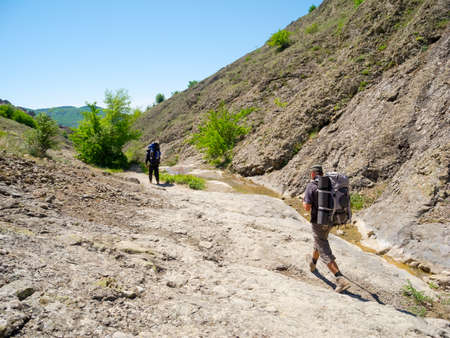 Hikers trekking in the Crimea mountainsの写真素材