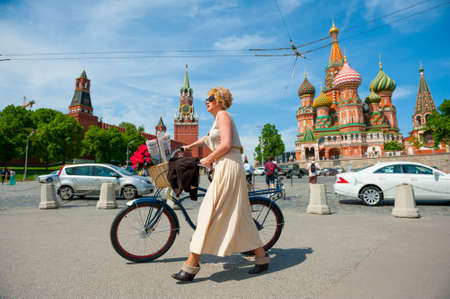 MOSCOW - MAY 19: Cyclist poses during the Day of the Uniform Bike Action on May 19, 2013 in Moscow. During this event many cyclists ride bicycles in an unusual wear and took part in the flash mobsのeditorial素材