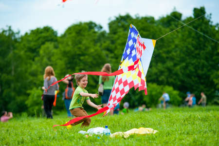 MOSCOW - MAY 25: Unidentified child flies kite at the kite festival in the park Tsaritsyno on May 25, 2013 in Moscow.のeditorial素材