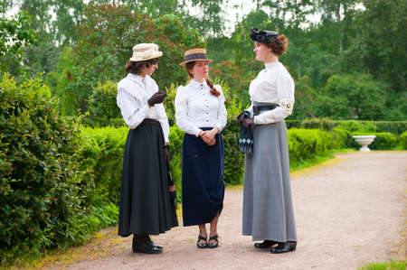 MOSCOW - JUNE 9: Members of the Historic Bike Ride in the park Sokolniki on June 9, 2013 in Moscow. At this event participants in period costumes ride vintage and military bikes 19-20th centuriesのeditorial素材