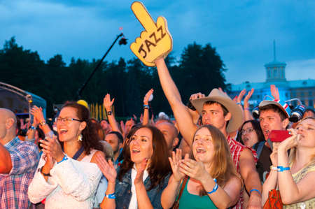 MOSCOW - JUNE 16: People cheering at open-air concert on X International Jazz Festival "Usadba Jazz" in Archangelskoye Museum-Mansion on June 16, 2013 in Moscowのeditorial素材