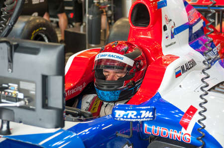 MOSCOW - JUNE 23: Mikhail Aleshin of Tech 1 R (FRA) ready for start at World Series by Renault in Moscow Raceway on June 23, 2013 in Moscowのeditorial素材