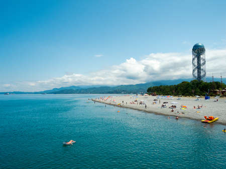 BATUMI, GEORGIA - JULY 7: Alphabet tower view from sea on July 7, 2013 in Batumi, Georgia. Georgian letters are embossed on 130 meter high tower to highlight the uniqueness of Georgian alphabet.のeditorial素材