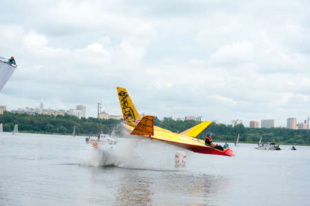 MOSCOW - JULY 28: Competitors perform a flight on Red Bull Flugtag on July 28, 2013 in Moscow. Red Bull Flugtag is an event in which competitors attempt to fly homemade human-powered flying machinesのeditorial素材