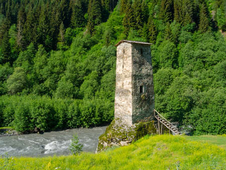Tower near the river in Svaneti, Georgiaの写真素材
