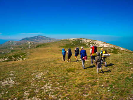 Hikers group trekking in Crimea mountainsの写真素材