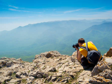 Photographer take a picture on a natureの写真素材