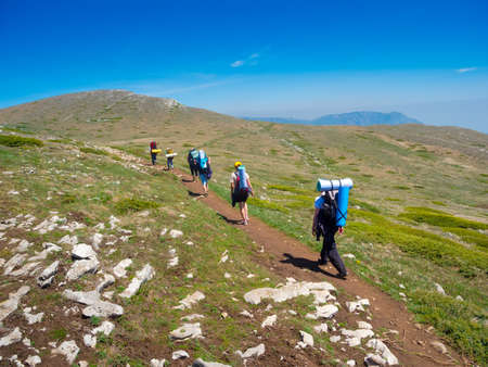 Hikers group trekking in Crimea mountainsの写真素材