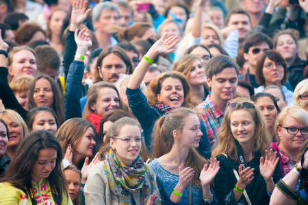 MOSCOW - JUNE 14: People cheering at open-air concert on XI International Jazz Festival "Usadba Jazz" in Archangelskoye Museum-Mansion on June 14, 2014 in Moscowのeditorial素材