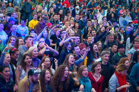 MOSCOW - JUNE 15: People cheering at open-air concert on XI International Jazz Festival "Usadba Jazz" in Archangelskoye Museum-Mansion on June 15, 2014 in Moscowのeditorial素材