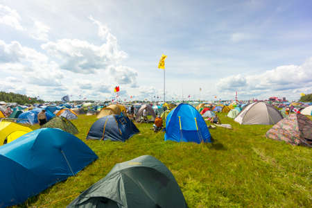 BIG ZAVIDOVO, RUSSIA - JULY 4: Campsite on open-air rock festival "Nashestvie" on July 4, 2014 in Big Zavidovo, Russia. "Nashestvie" is the biggest rock festival in Russia, more than 200000 visitorsのeditorial素材