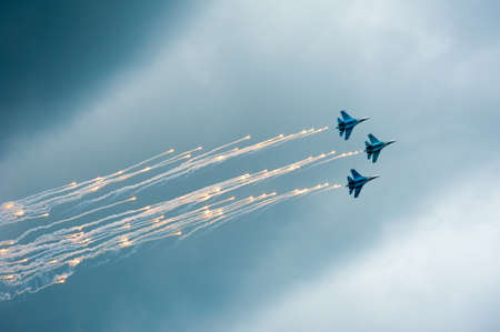 BIG ZAVIDOVO, RUSSIA - JULY 5: Group of russian military jets Su 27 performs at open-air rock...