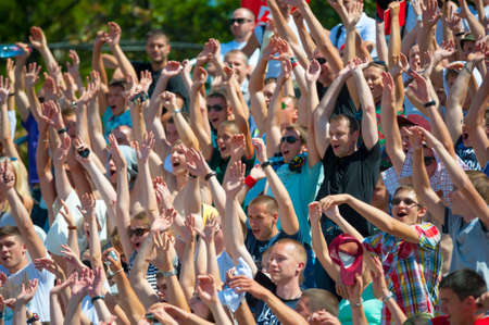 MOSCOW - JULY 26: People cheering at Moscow City Games in Luzhniki on July 26, 2014 in Moscow.