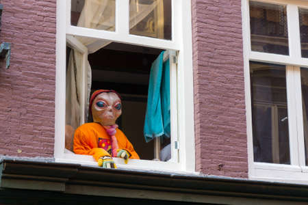 Alien in the windowの写真素材