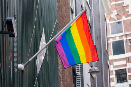 Rainbow flag on the wall in Amsterdam