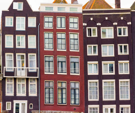 Facades of houses in old city in Amsterdam