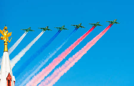 MOSCOW - MAY 7: Figters do smoke in colors of Russian flag at last rehearsal of the parade dedicated...