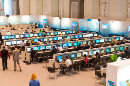 MOSCOW - MAY 9: Journalists work in the international press center, they write news about 70th anniversary of the victory in the Second World War events on May 9, 2015 in Moscowのeditorial素材