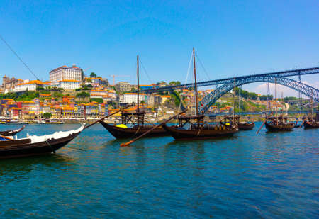 Porto, Portugal old town skyline on the Douro River with rabelo boatsの写真素材