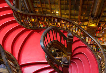 PORTO, PORTUGAL - JUNE, 12: Famous bookstore Livraria Lello interior on June 12, 2015 in Porto, Portugalのeditorial素材