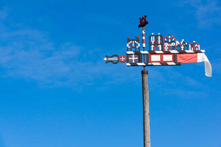 Wooden carved weather vane in Nida, Lithuania