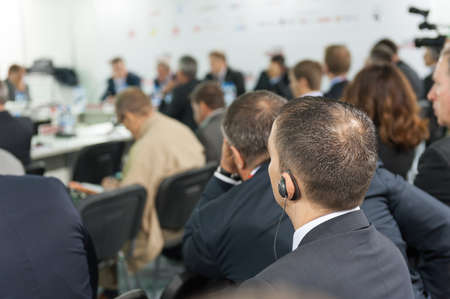 Audience at the conference hall. No recognisable facesの写真素材