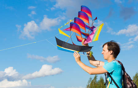MOSCOW - AUGUST 30, 2015: Unidentified man launches ship kite to the sky in Tsaritsyno Park on...