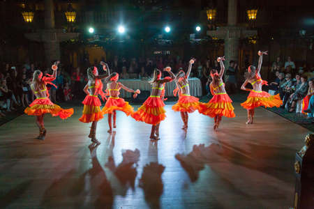 MOSCOW - OCTOBER 18: Unidentified female teens age 14-17 compete in latino dance on the Artistic Dance Awards 2014-2015, organized by World Dance Artistic Federation on October 18, 2015 in Moscow.のeditorial素材