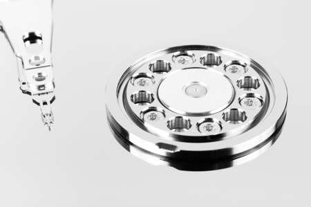 Inside hard drive cylinder and head macroの写真素材