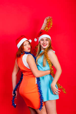 Young nice girls have fun on a christmas partyの写真素材