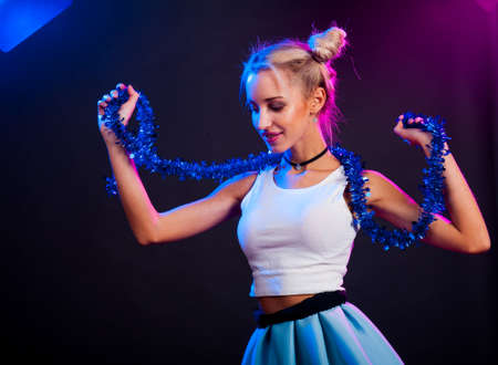 Young nice girl have fun on a dance partyの写真素材