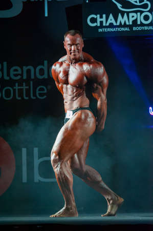 MOSCOW, RUSSIA - NOVEMBER 21, 2015: Athlete participates in Bodybuilding Champions Cup during SN Pro Expo Forum 2015 on November 21, 2015 in Moscow, Russiaのeditorial素材