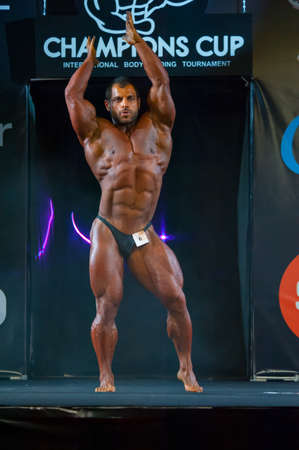 MOSCOW, RUSSIA - NOVEMBER 21, 2015: Athlete participates in Bodybuilding Champions Cup during SN Pro Expo Forum 2015 on November 21, 2015 in Moscow, Russiaのeditorial素材