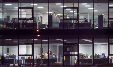 VILNIUS, LITHUANIA - DECEMBER 15, 2015: People work in an office building on December 15, 2015 in...