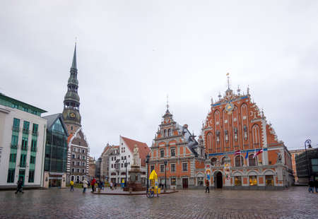 RIGA, LATVIA - DECEMBER 19, 2015: Illuminated house of the Blackheads at day time on December 19, 2015 in Riga, Latviaのeditorial素材
