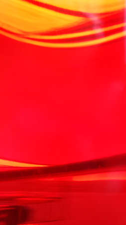 Abstract red vertical background with curved linesの写真素材