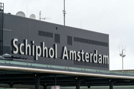 Amsterdam - July 1, 2016: Airport Schiphol sign in the daytime