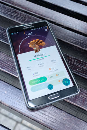 Moscow - August 6, 2016: Samsung Galaxy smartphone with a running Pokemon Go applicationのeditorial素材